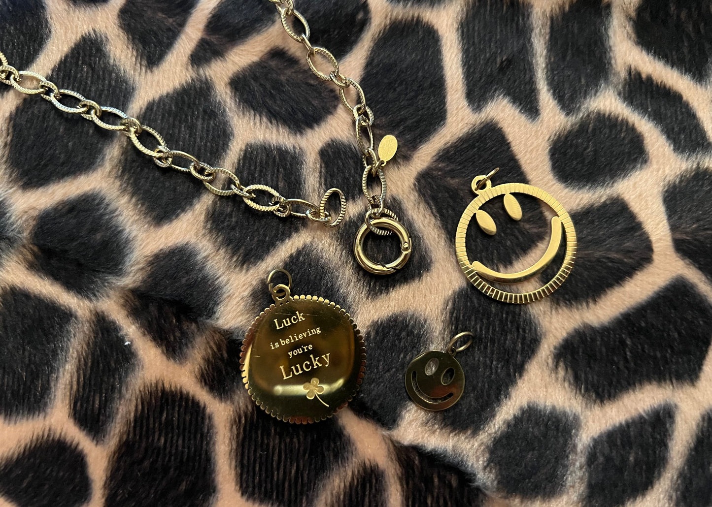 Smiley ketting goud